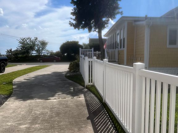 driveway, can fit at least two cars