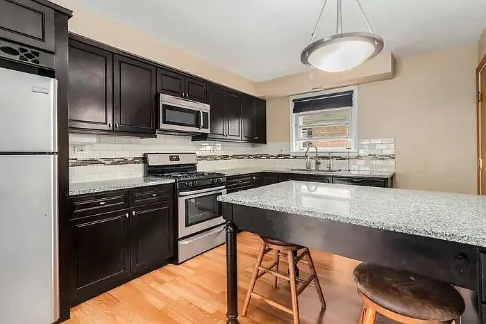 Building Photo - 4406 W 55th St #1