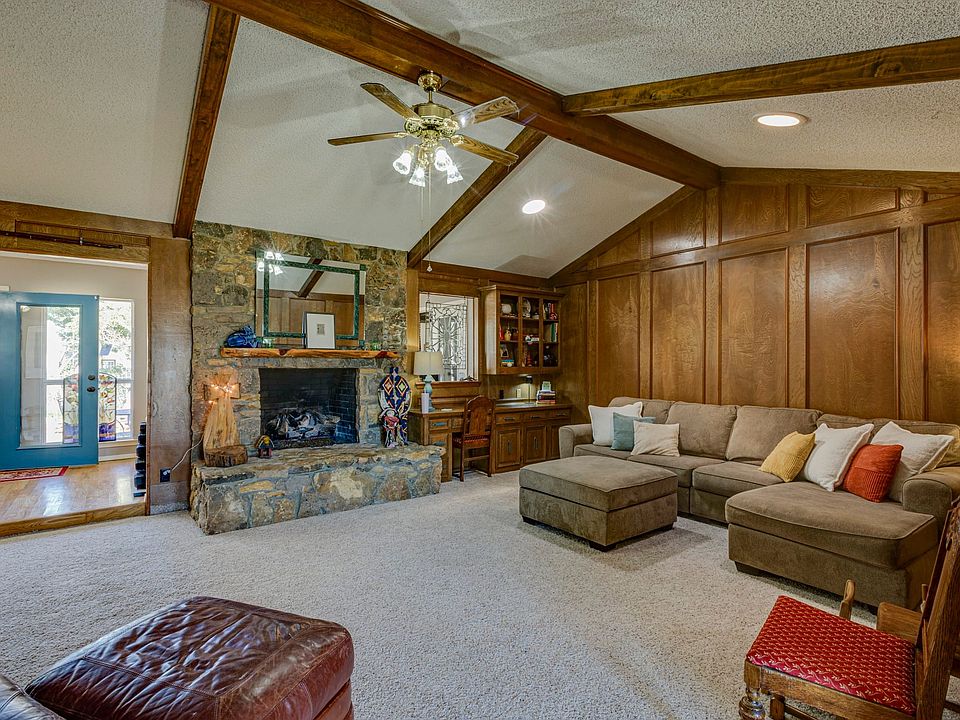 You will appreciate the rich paneling and ceiling beams.