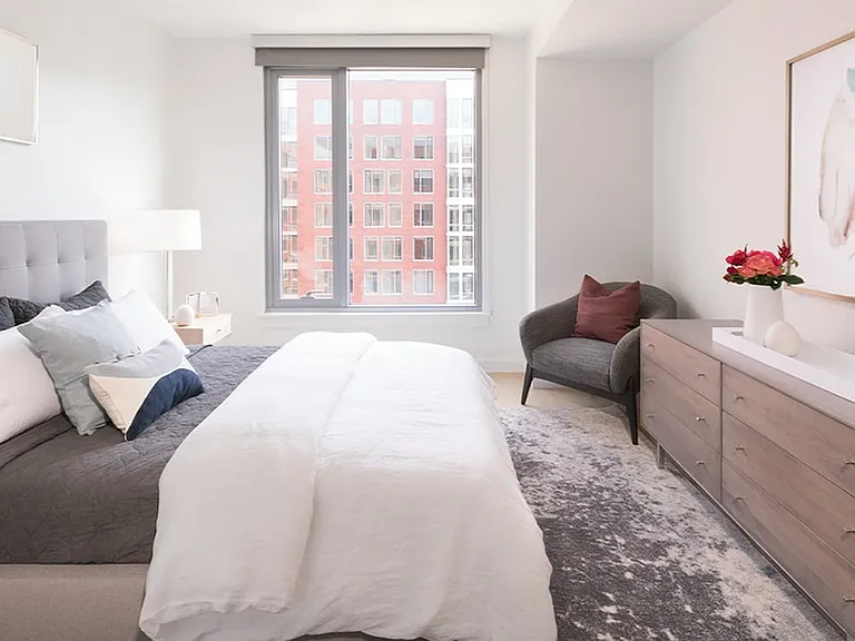 King sized bedroom with oversized window
