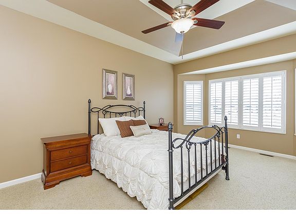 Master Bedroom with Coffered Ceiling and Bay Window
