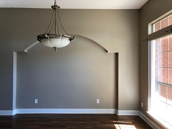 Formal dining room at right side of the entry