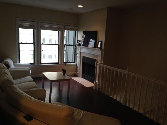 Lovely living room with great natural light and real wood fi