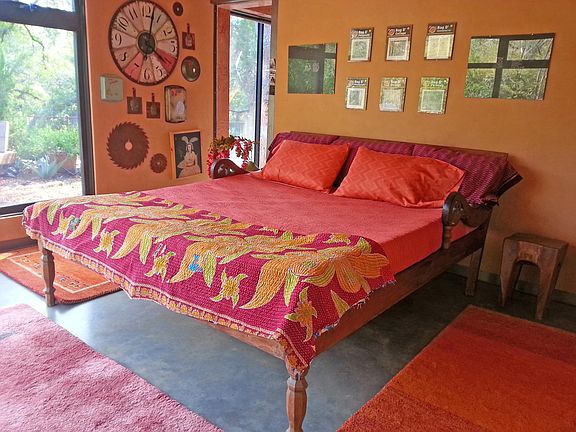 The Garden Room Bedroom set up with a King bed.