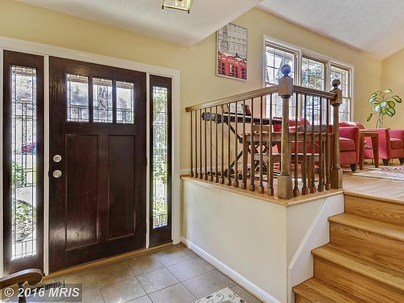 Welcoming foyer with newer front door