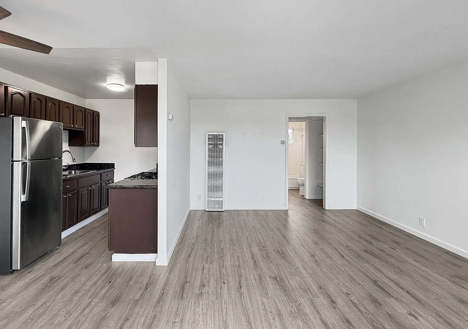 First month FREE! Fantastic Top-Floor Apartment in an Extremely Well-Maintained Gated Building — Photo 1