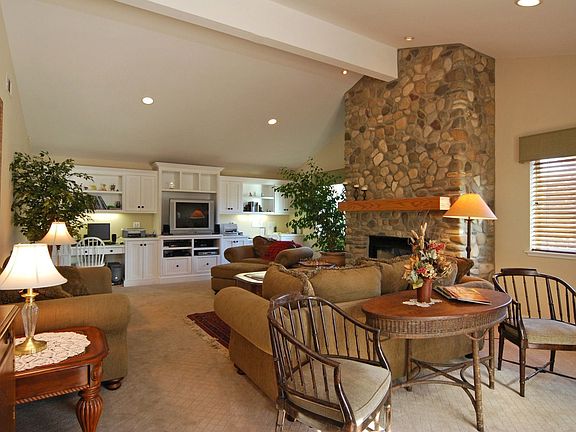Beautiful family room with fireplace and built in media center