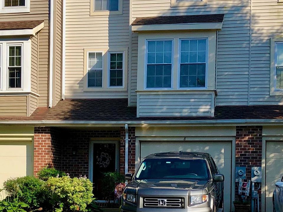 Front of house, garage and parking pad