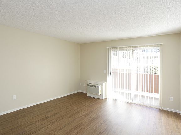 Living room areas with sliding glass door