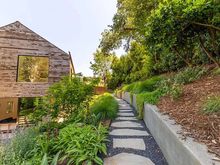 Path to hot tub, bridge and Casita