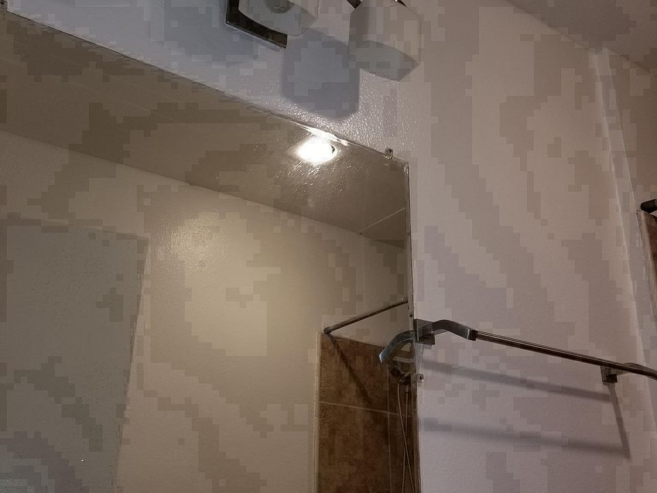 new bathroom light. New towel hardware.