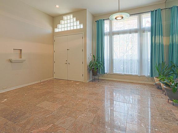 Front entrance and formal dining area with Marble flooring