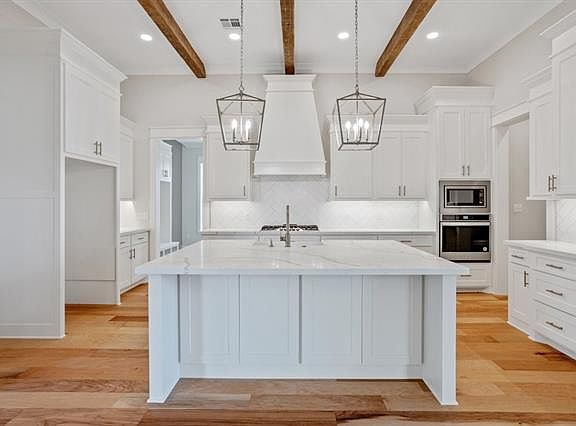 4th image of 6444 White Oleander Dr W