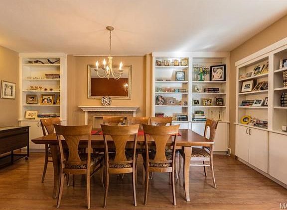 Abundant built-in cabinets in dining room.
