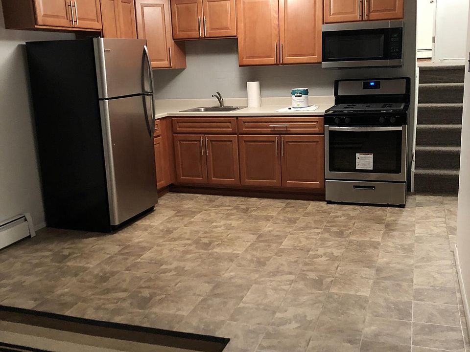 Completely renovated open kitchen adjacent to large living s