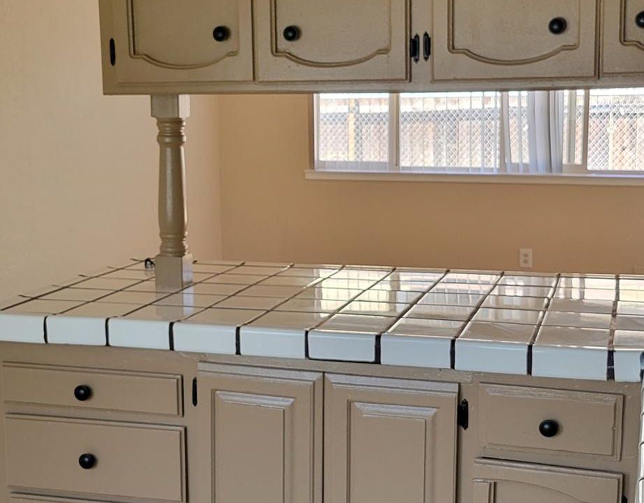 Freshly painted Kitchen Cabinets, Tile Floors