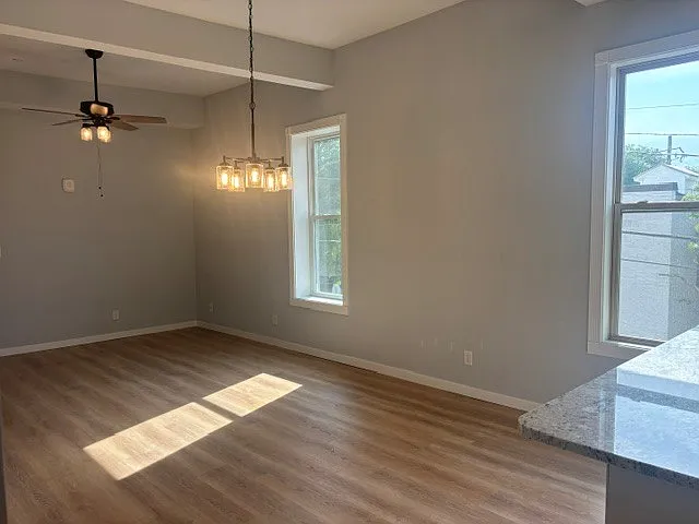 HUGE windows with East Light coming into Dining and Living spaces