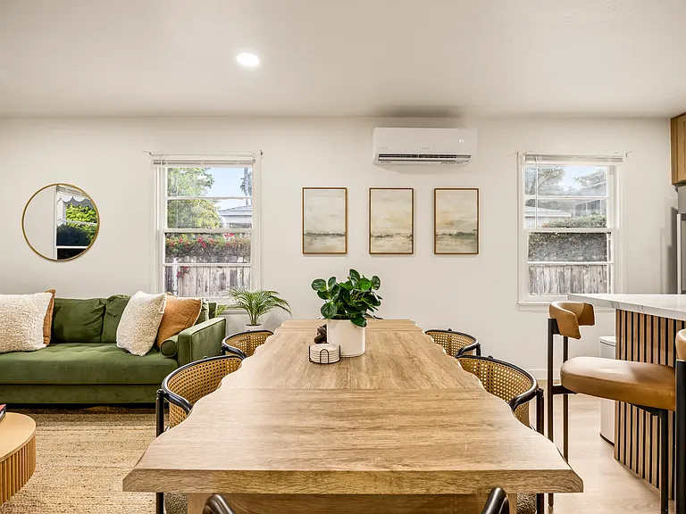 Dining area offers a comfortable space for shared meals, morning coffee, or game nights.