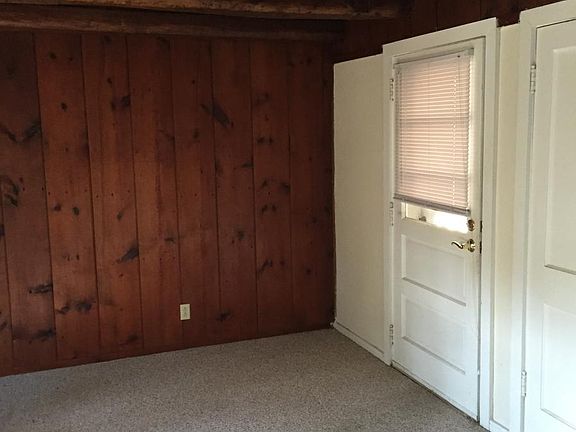 Living Room/Front Door (now has oak floor)