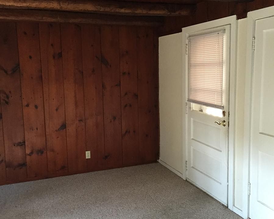 Living Room/Front Door (now has oak floor)