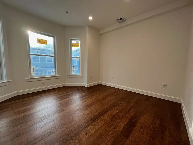 West bedroom with bay windows