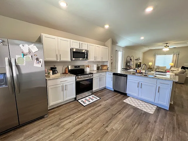 You'll love the white shaker cabinets, granite countertops, stainless steel appliances.