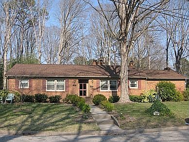 Brick one-story home in established neighborhood