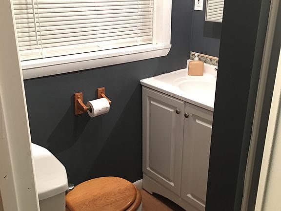 Downstairs half bath with walk-in shower