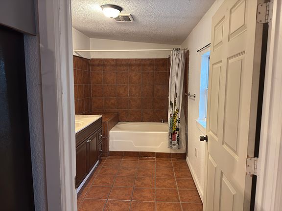 Standing in bathroom doorway looking straight on