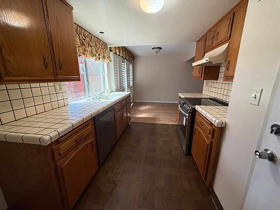 Dining room is adjacent to the kitchen and opens to the patio, providing a convenient flow for everyday living and outdoor gatherings.