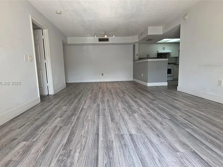 5011 Wiles Rd #203 — Photo 4
