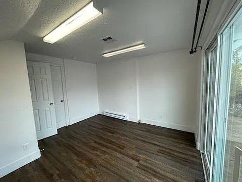 Front day room with sliding glass door and view of the Kolob Canyons
