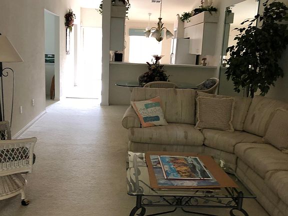 Living & Dinning Area - Open to Kitchen & a View Through 4 S
