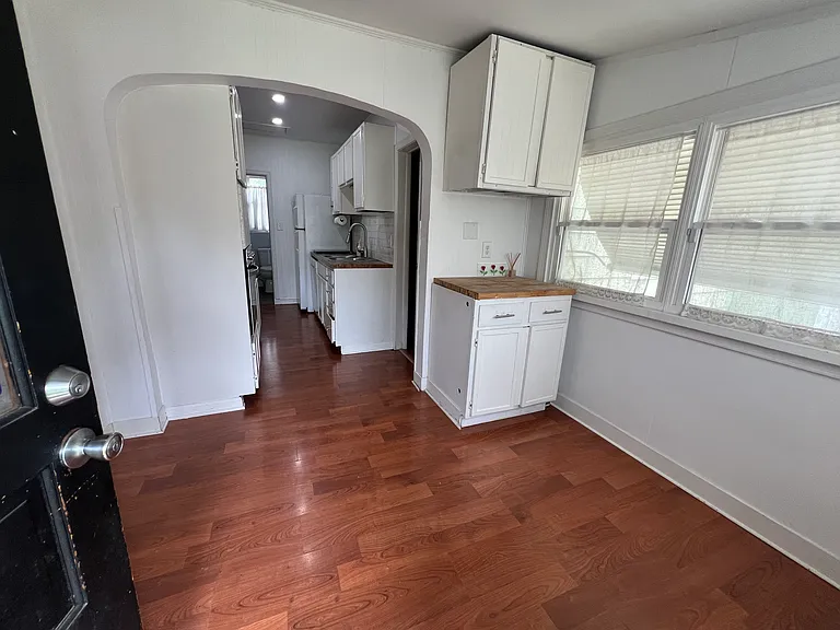 Cute sunroom attached to kitchen.