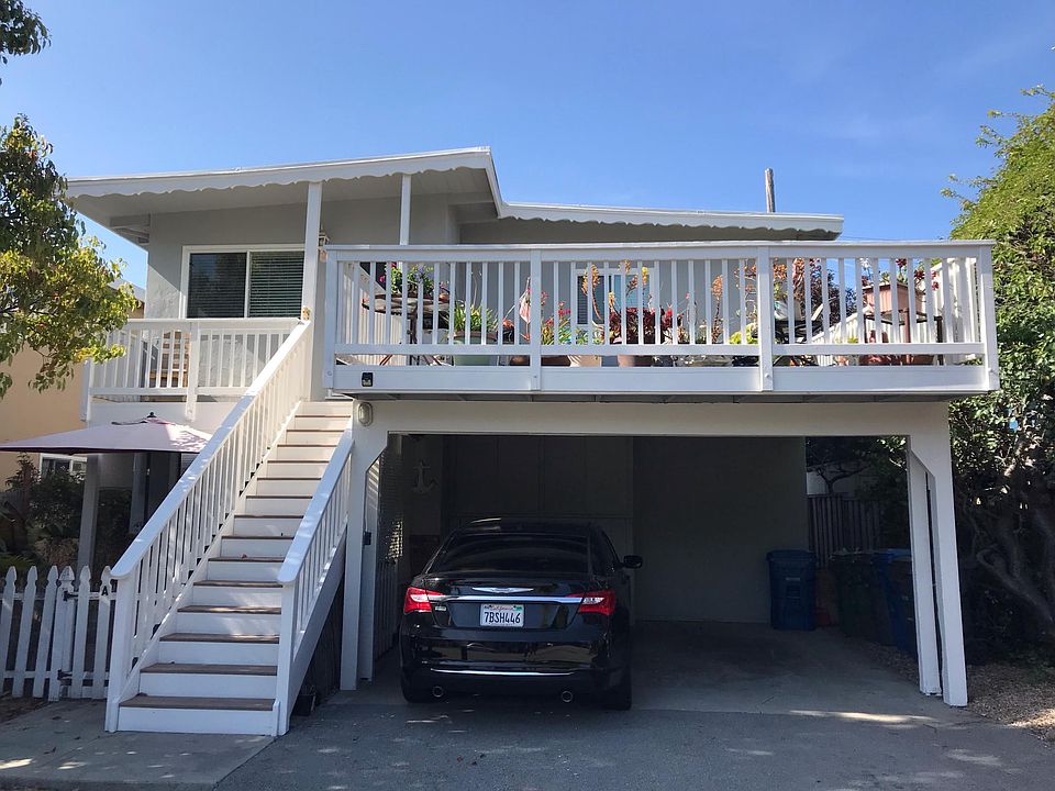 Parking space on the left of the driveway and additional storage