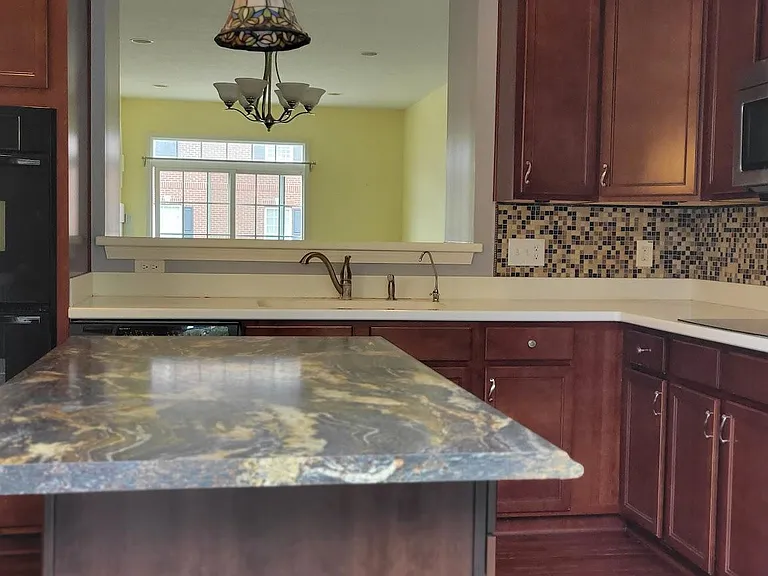A spacious island makes preparing delicious meals for guests both enjoyable and convenient.