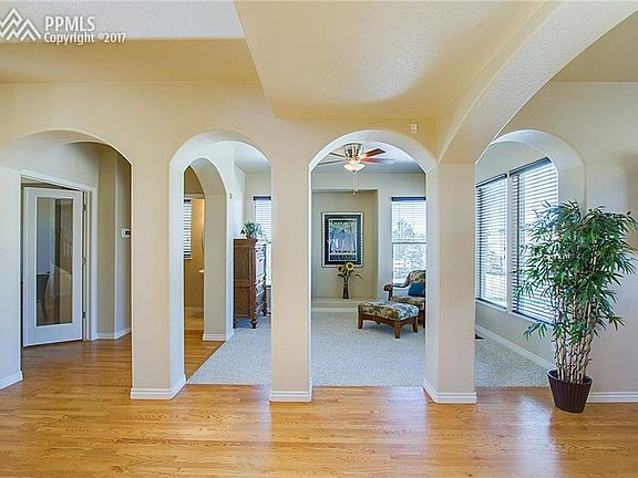 Archways from entry into living room