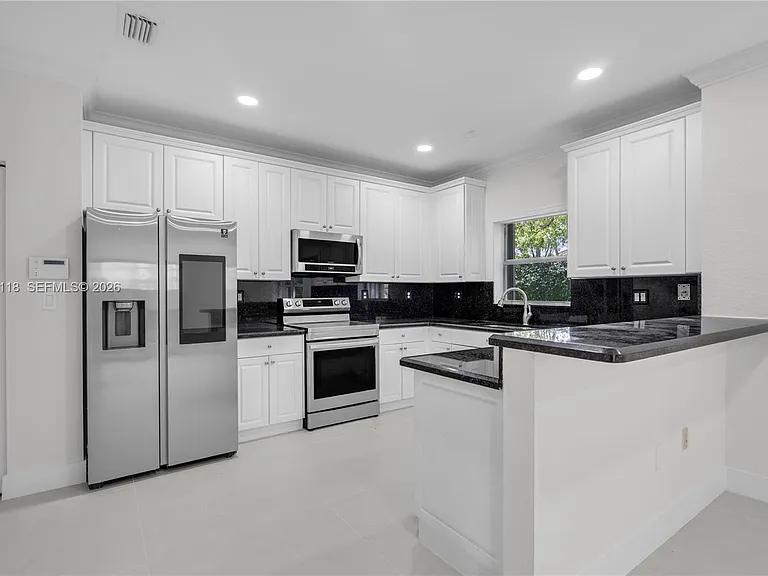 7482 NW 21st Ct — Photo 13