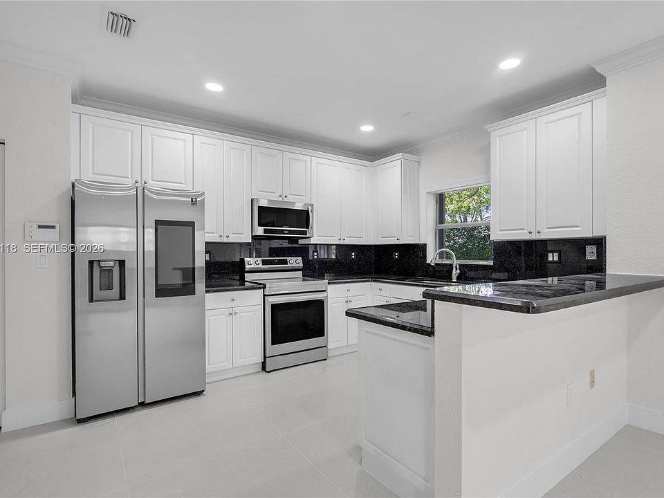1st image of 7482-7482 NW 21st Ct