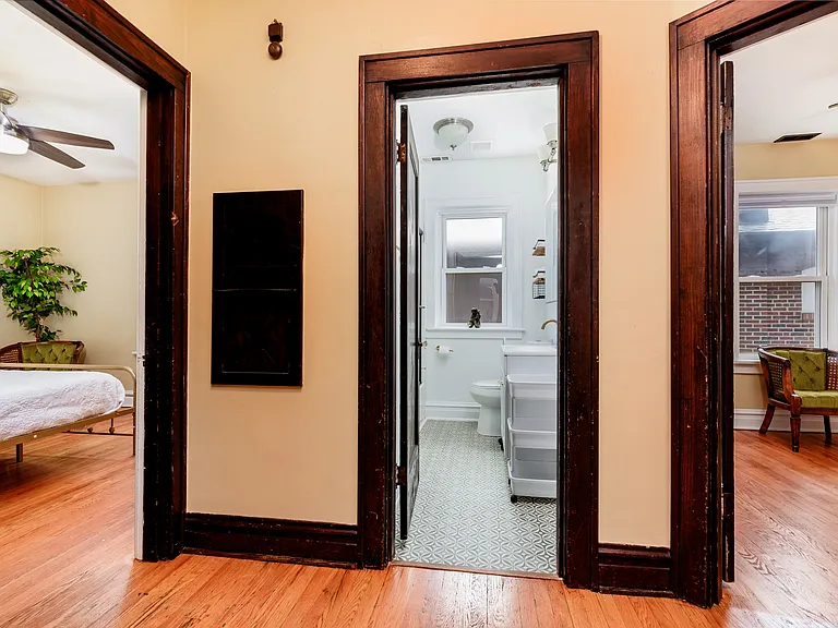 From the Left; back bedroom, old school telephone built in, door to bathroom, middle bedroom
