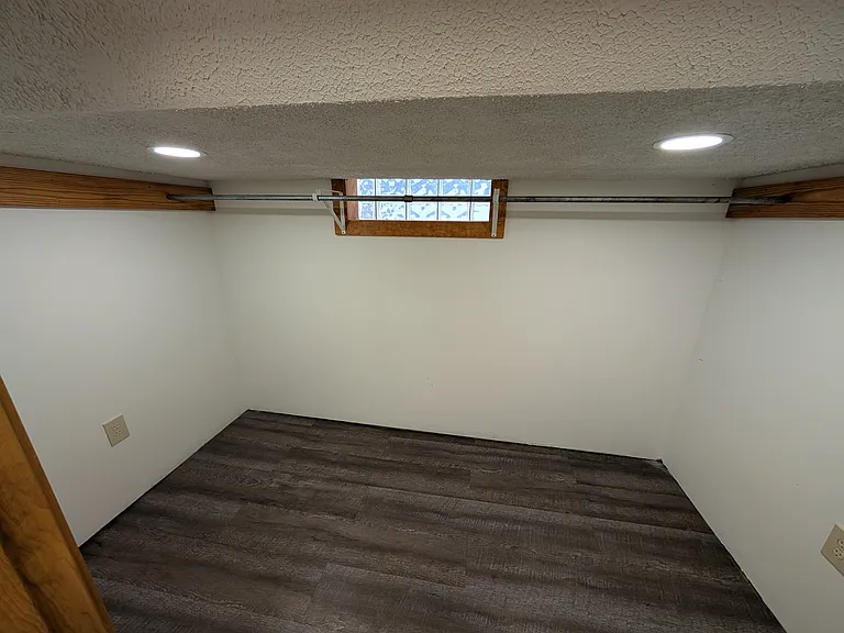 Closet 1 is the larger of the two with extra reinforced clothes bar