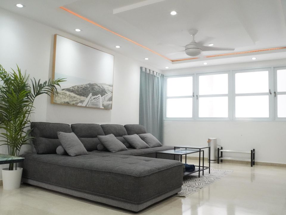 Spacious living space with sectional sofas, expandable coffee table, quartz drink coasters, large Smart TV, sound bar, spacious storage space etc.
