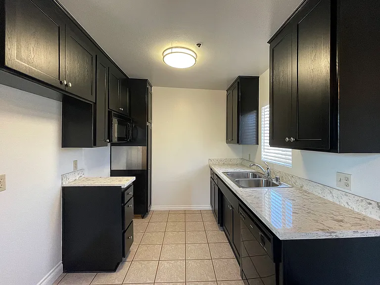 Bright kitchen with roomy, custom cabinets