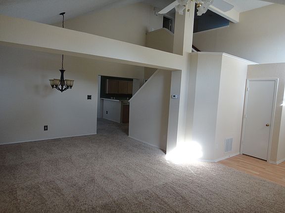View of formal dining and stairs