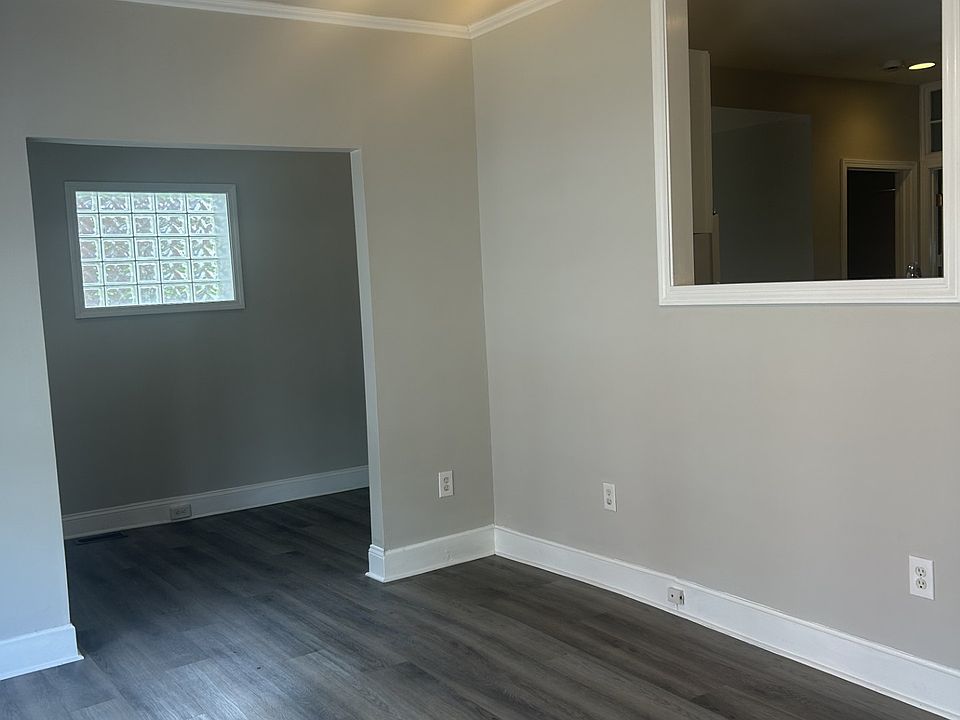 Living room and see through window to kitchen