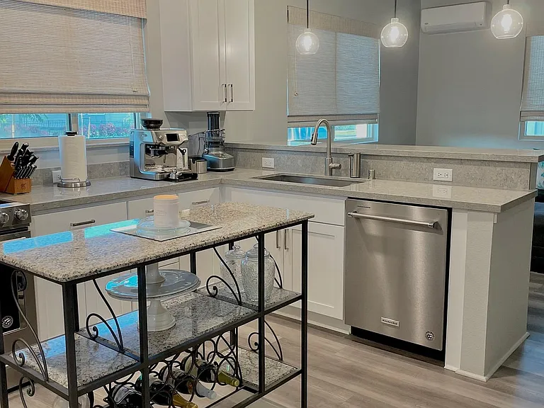 Kitchen with pendant lighting.