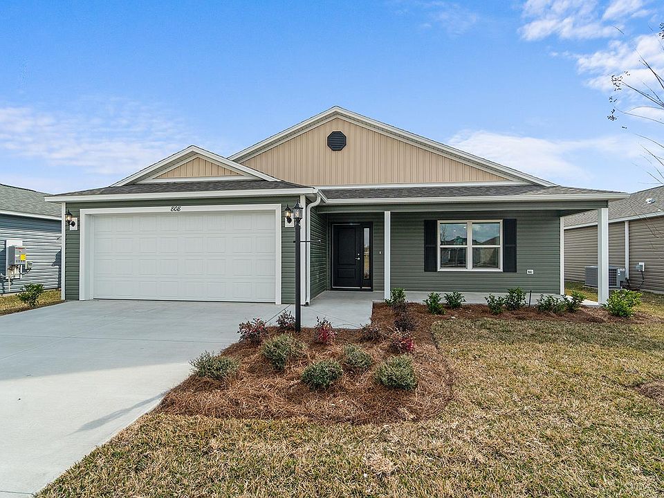 Front of home with patio