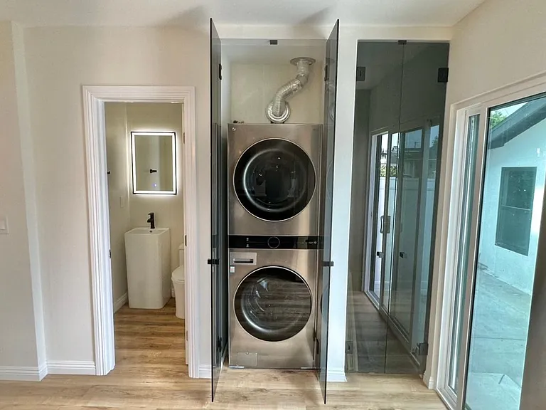 Washer & Dryer / Pantry / Guest Bathroom