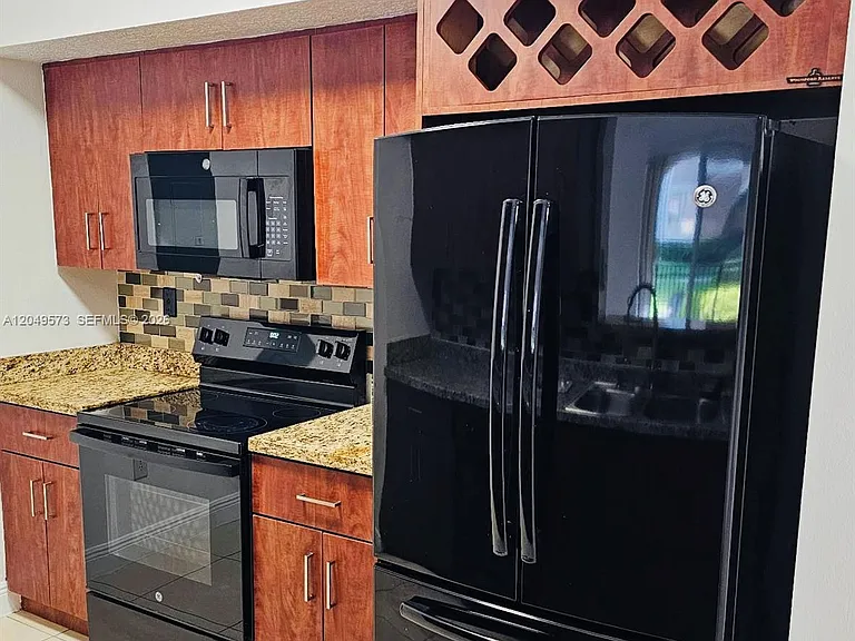 215 SW 117th Ter #14104 — Photo 1