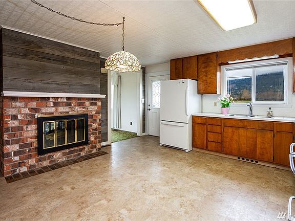 Kitchen with double sided fireplace